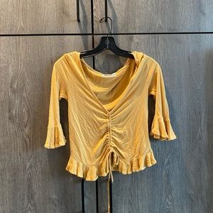 Yellow polka dot tie top with bell sleeves